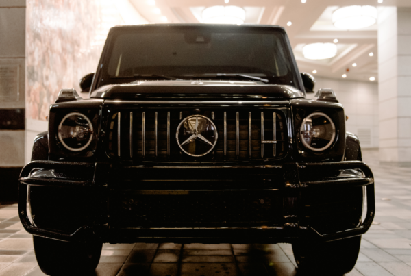 Front view of a black merceded G-Wagon