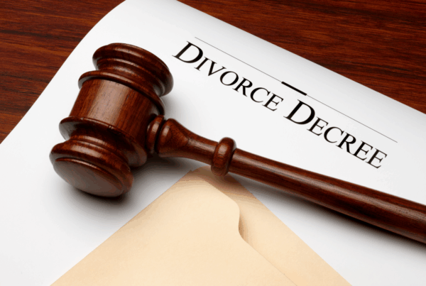 Gavel resting on a final divorce decree document